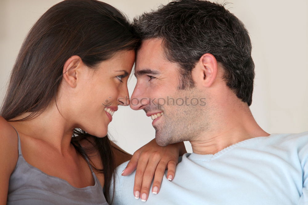 Similar – Image, Stock Photo Smiling couple of lovers having fun.