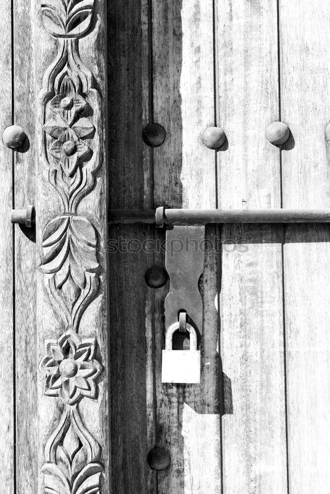 Similar – rusty garden gate closed with chain, with blurred background