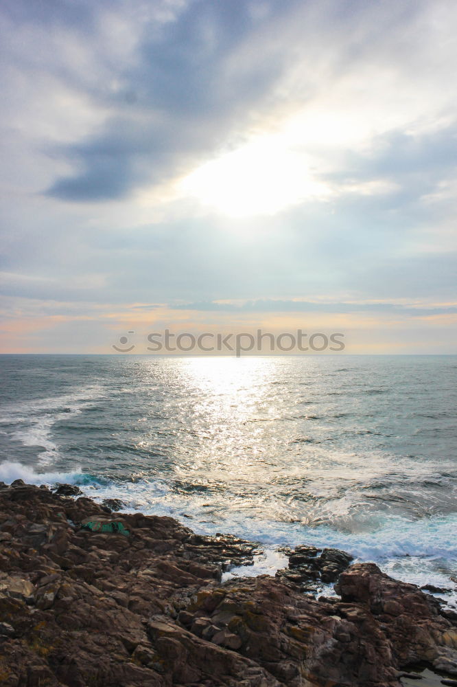 Similar – Image, Stock Photo Foaming surf on rocky coast, blue sky, clouds and high mountains in the background, Queensland / Australia . ,Lookout