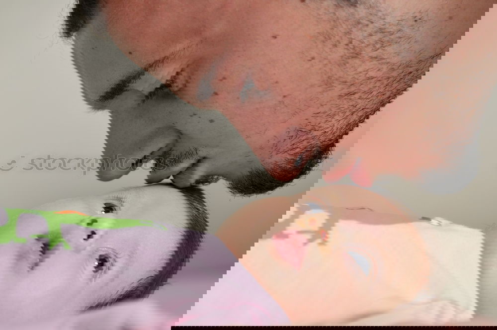 Similar – Image, Stock Photo Man kissing to peaceful newborn lying over bed