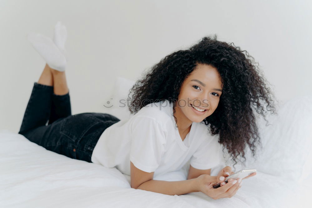 Similar – Beautiful serious thoughtful and sad black woman covering her head with sheet in bed