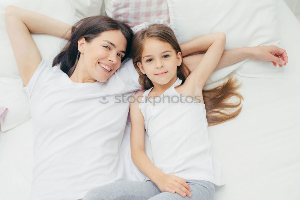 Similar – Image, Stock Photo Mother and daughter smiling and hugging outdoors
