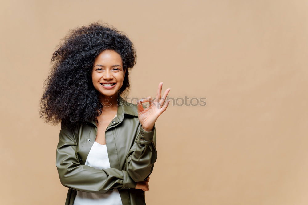 Similar – Young black woman, afro hairstyle, smiling outdoors