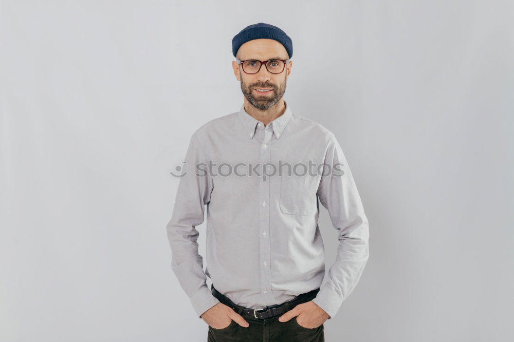 Similar – Man with mustache and glasses standing looking at camera.