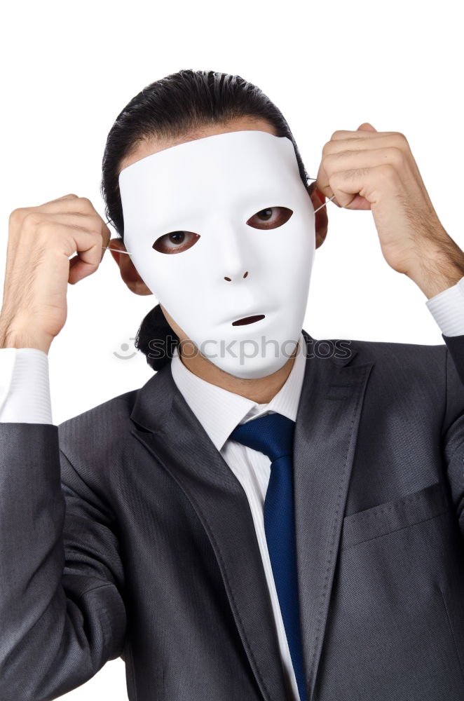 Similar – happy mature woman peeking from behind mask