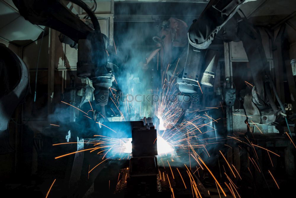 Similar – Image, Stock Photo Mechanic man welding metal material in garage