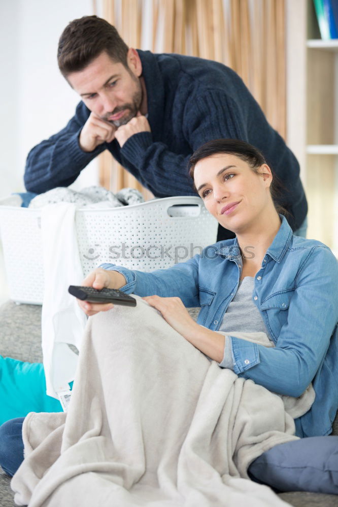 Similar – Image, Stock Photo Young couple reading book on couch at home