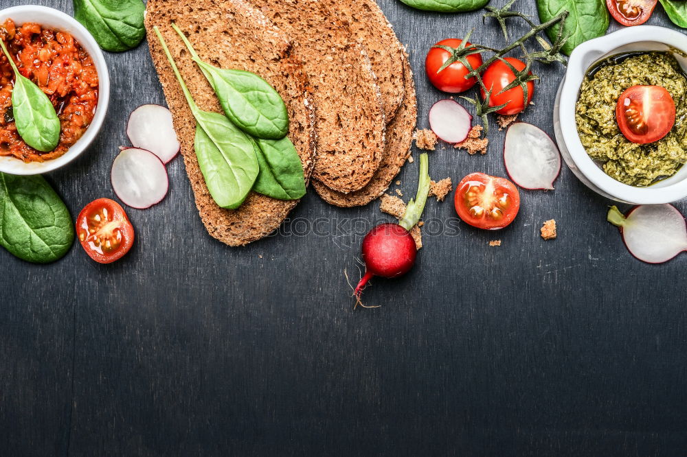 Similar – Green noodles with green cabbage pesto and grilled tomatoes