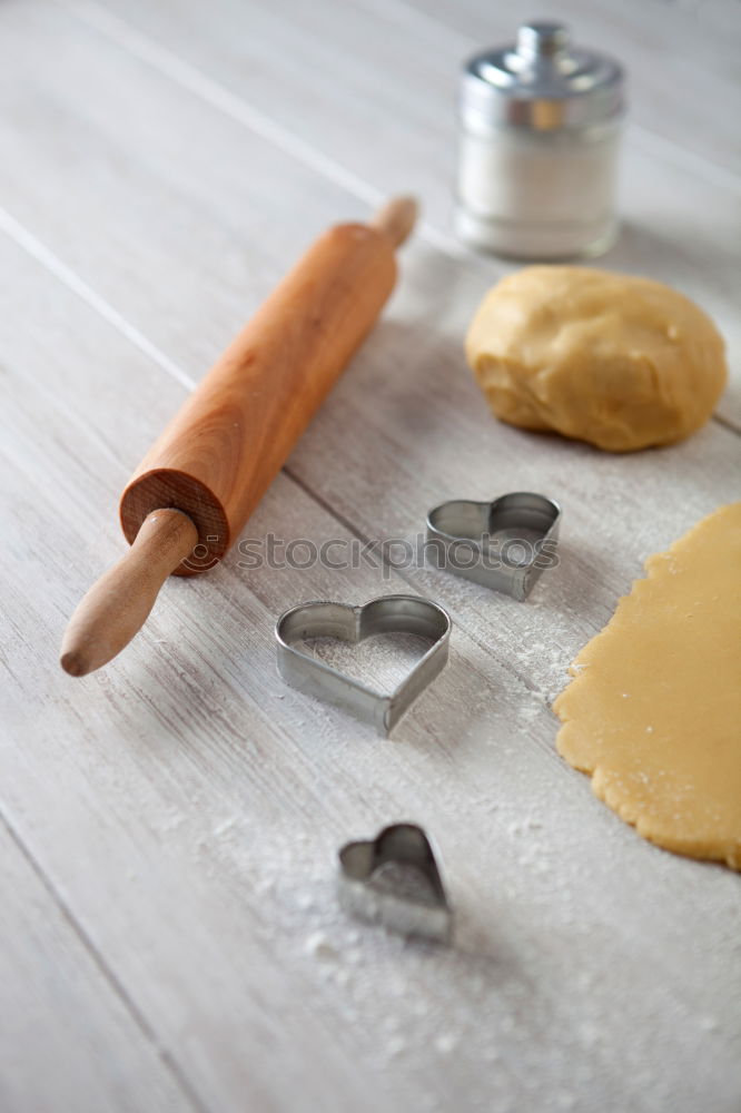 Image, Stock Photo Close up of cookie cutters and rolling pin on a dark table