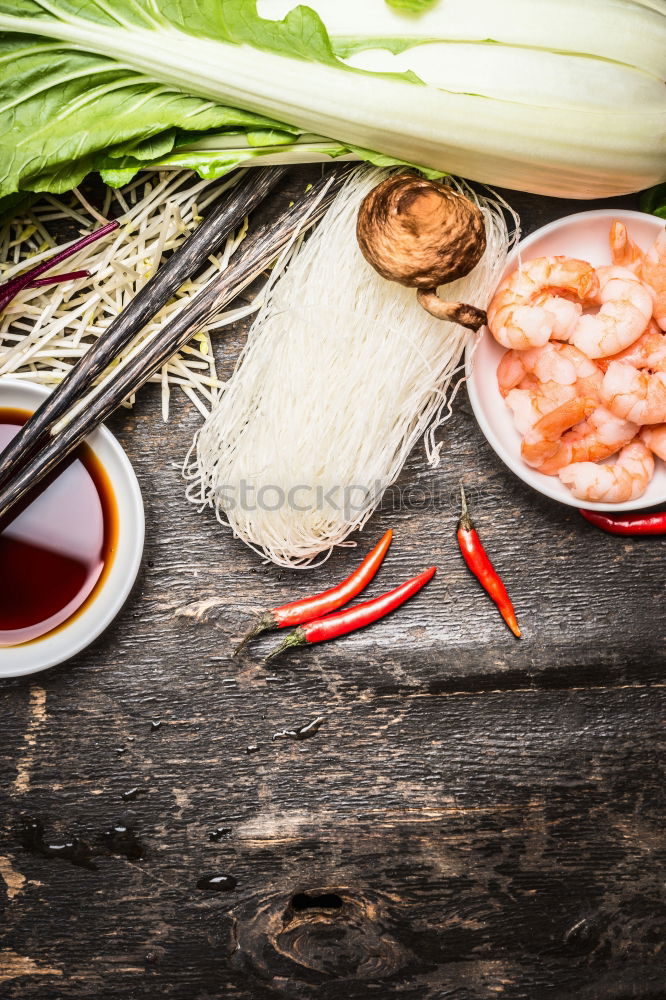 Similar – Image, Stock Photo Soy sauce with chopsticks, rice noodles and vegetables