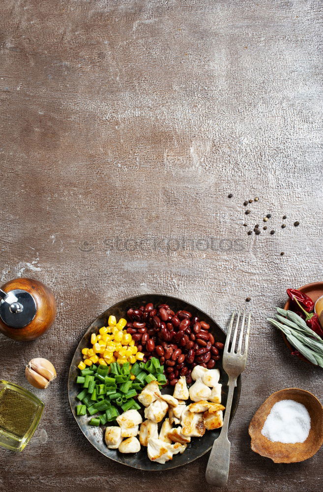 Similar – Green salad with pomegranate, manna croup, onion.