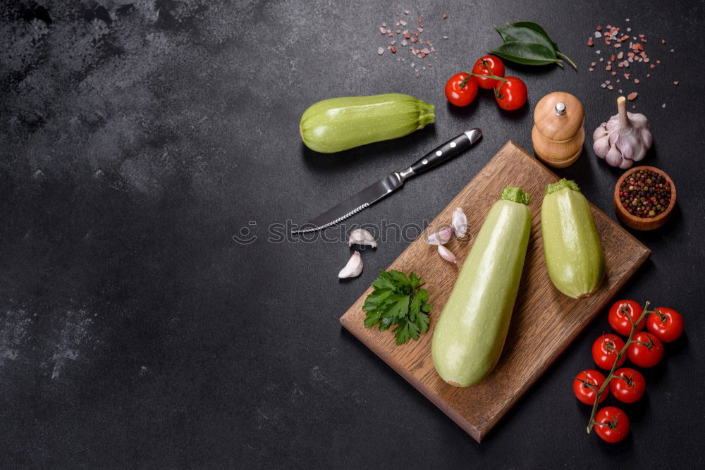 Similar – Image, Stock Photo Sliced cherry tomatoes on cutting board