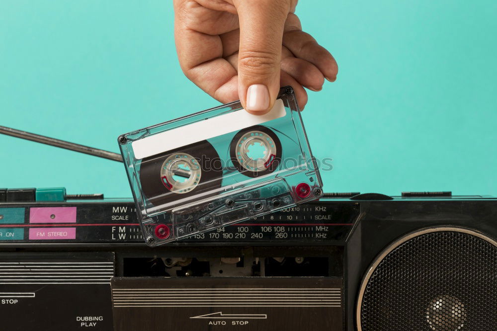 Similar – Hand holding a Vintage camera isolated at pink wall