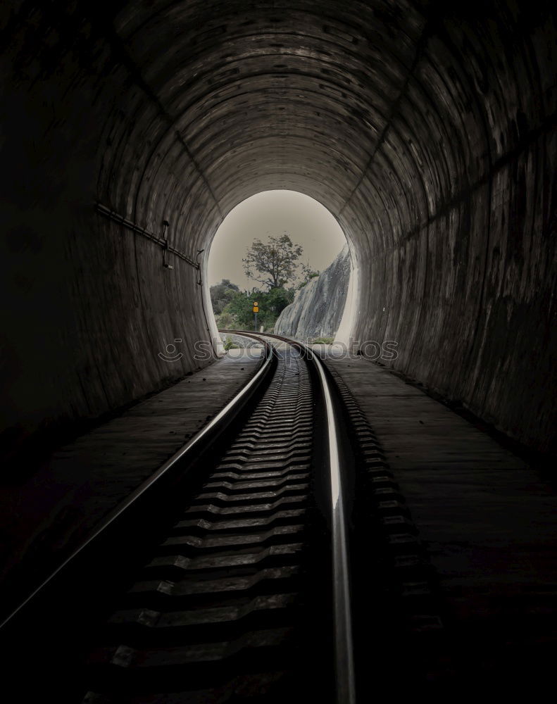 Similar – The light at the end of the tunnel