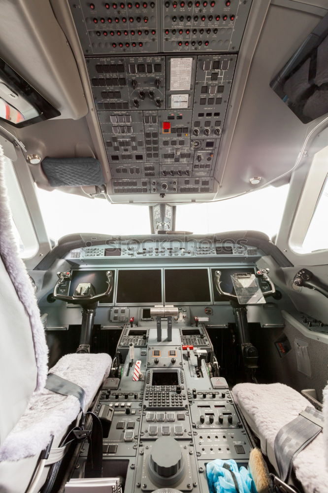 Interior of a pilot cockpit cabin private jet