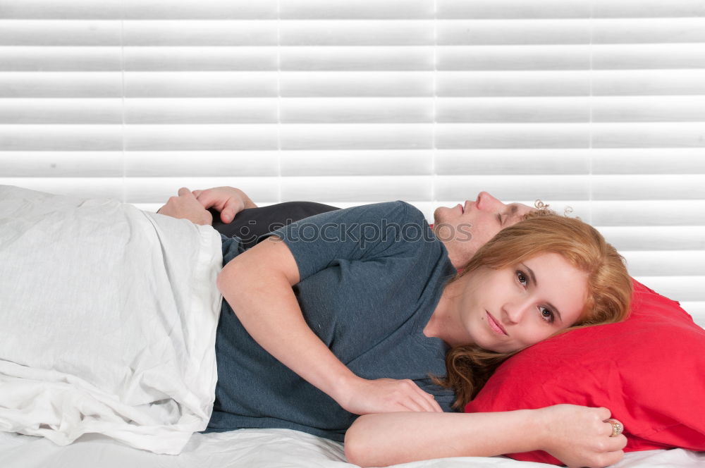 Similar – Brother and sister tickling and laughing on bed