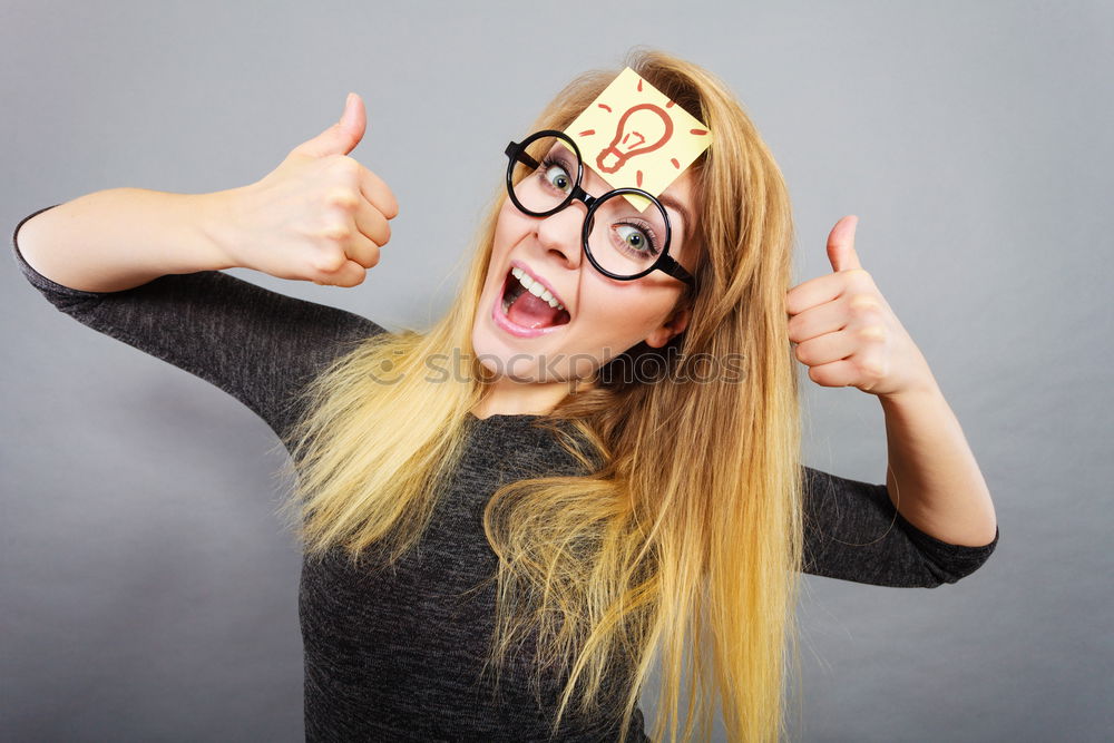 Similar – woman covering her eyes with pieces of sushi