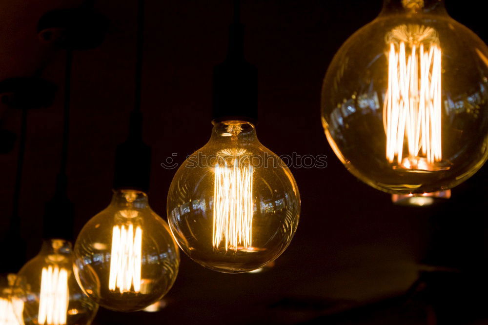 Similar – Image, Stock Photo Vintage incandescent Edison type bulbs