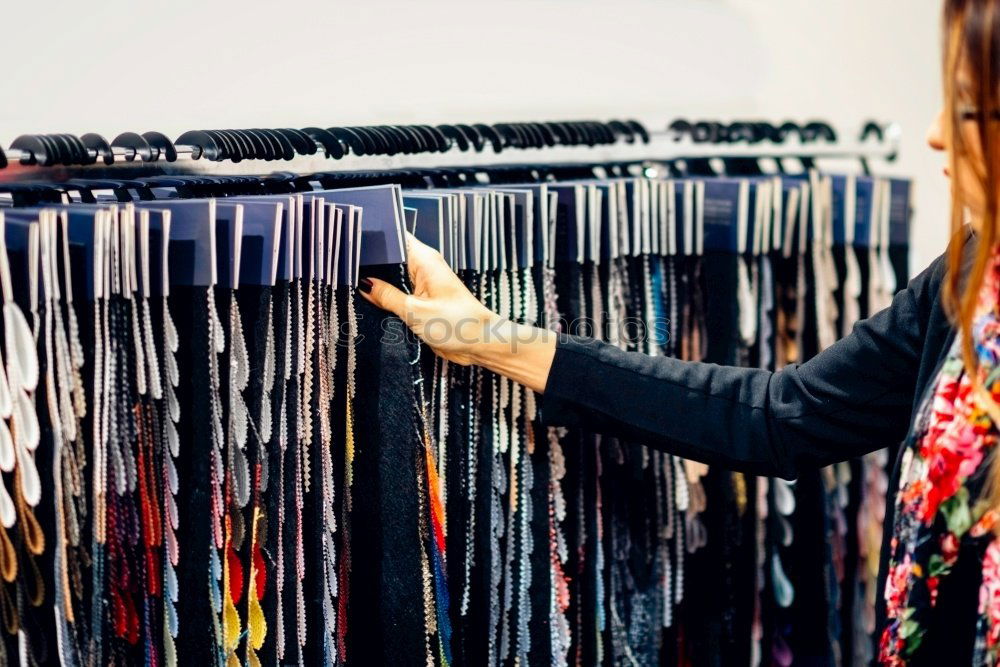 Image, Stock Photo Pretty sian woman in clothes store