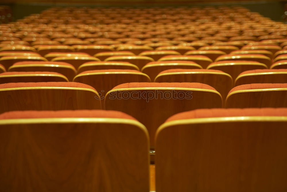 Similar – Theaterstuhl in roter Farbe im Konferenzraum.