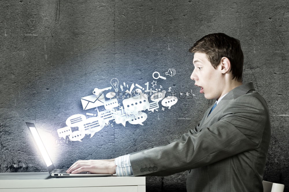 Similar – Image, Stock Photo Concept of social media chat. Single white adult man standing in front of a blackboard using his smart phone