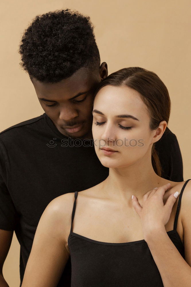 Similar – Loving Young Couple Hugging And Kissing At Home Standing In Kitchen Together