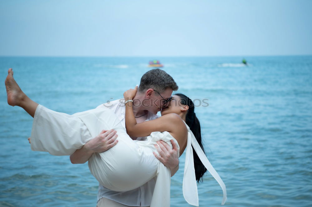 Similar – Beautiful wedding couple at the beach