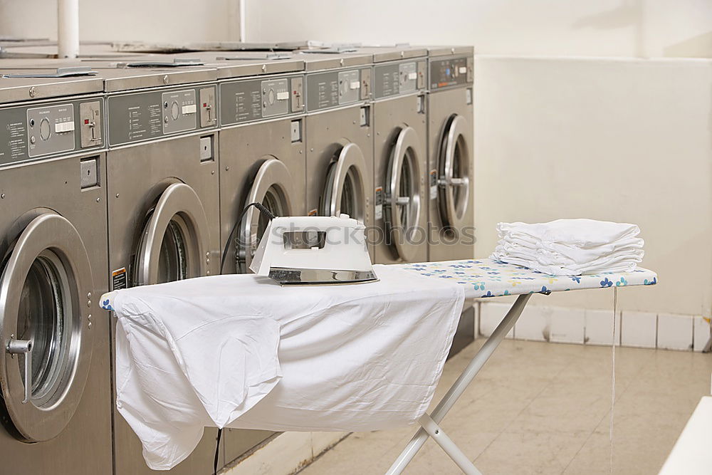 Similar – clean Laundromat Washer