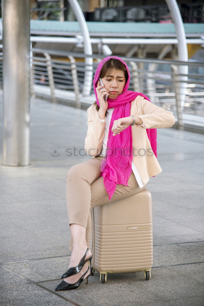 Similar – Image, Stock Photo Young Arab woman tourist waiting her train in a subway station