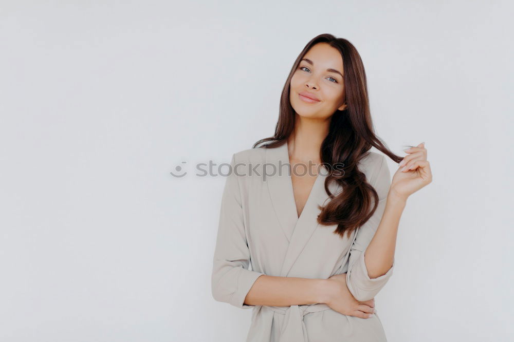 Stylish woman in jacket talking phone