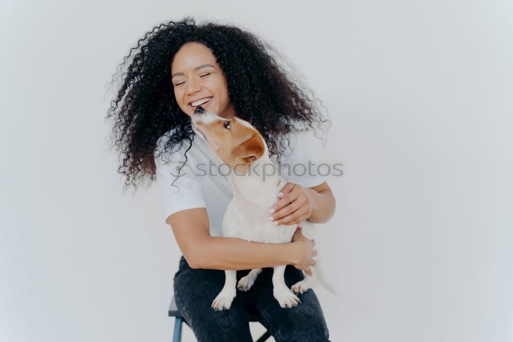 Black woman holding a cute bunny