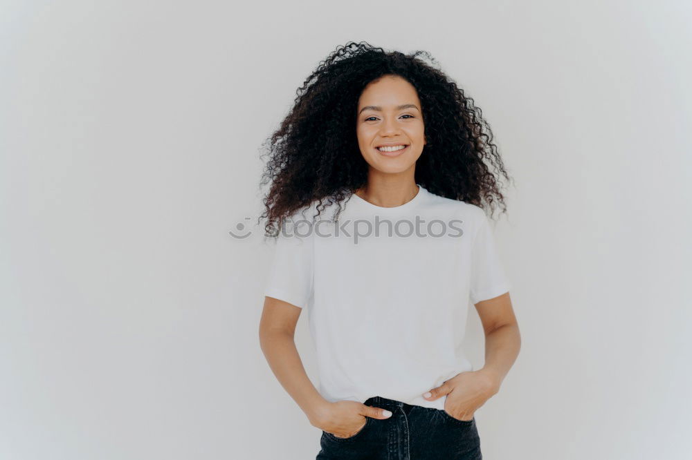 Similar – Young happy woman surrounded by green leaves