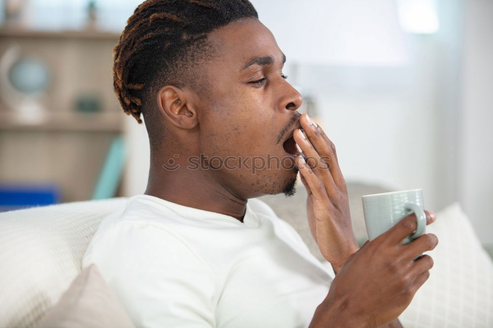 Similar – Image, Stock Photo Portrait of a young thoughtful mixed race man sitting in the sofa