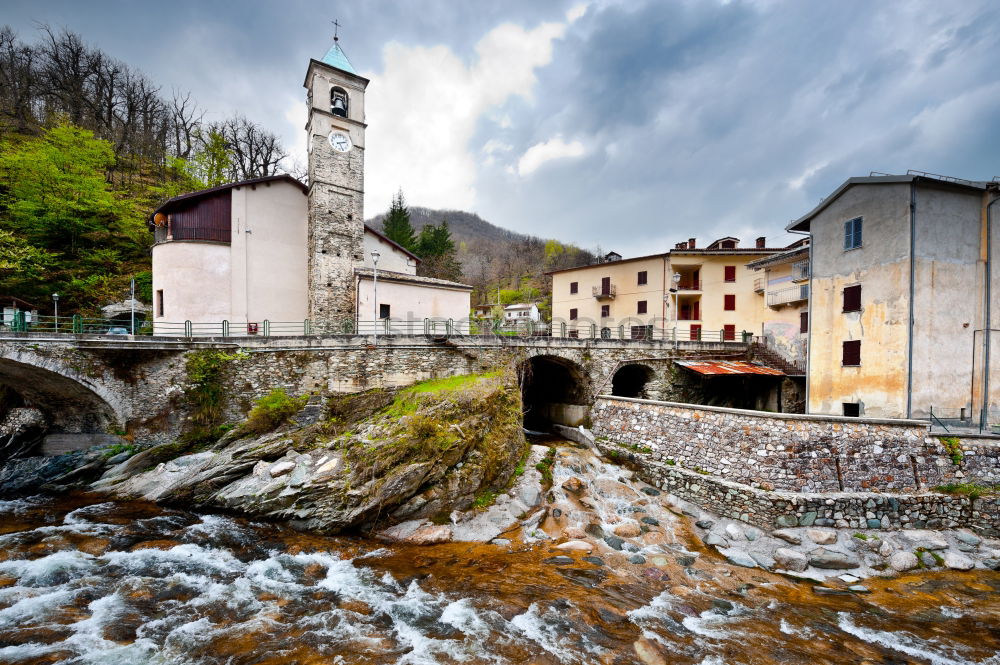 Image, Stock Photo stone bridge of an ancient village under cloudy sky