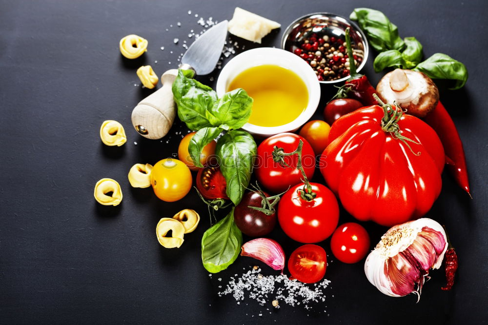 Similar – Whole wheat pasta, basil, tomatoes and garlic