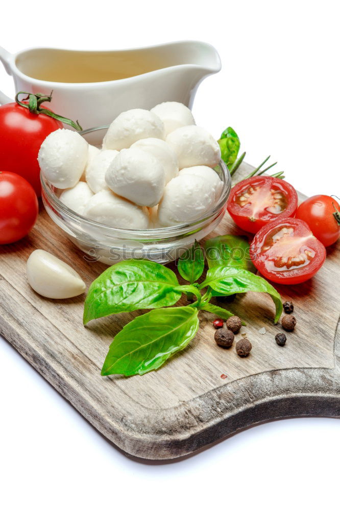 Similar – Italian cheese burrata, tomatoes, basil and bread