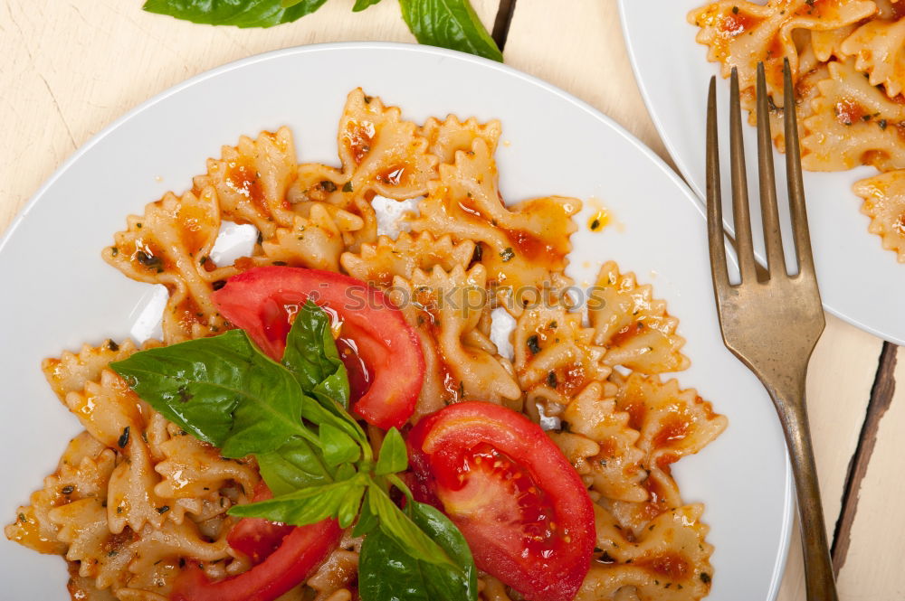 Similar – Image, Stock Photo Tortellini with tomatoes and vegetable sauce