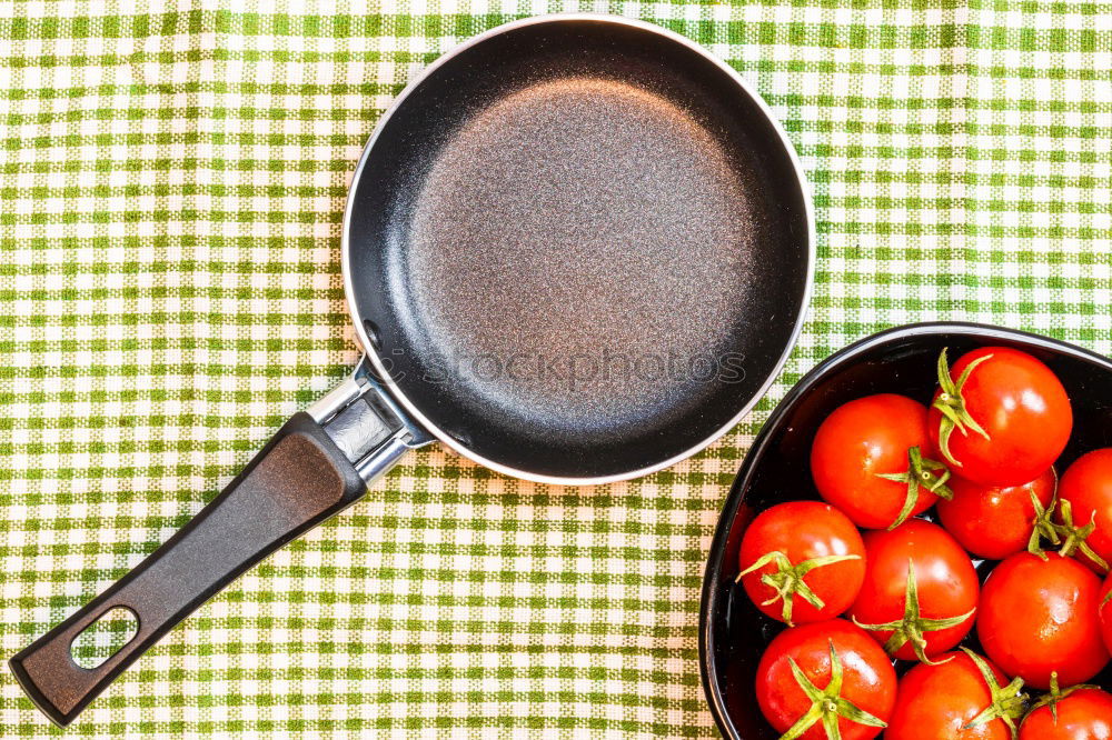 Similar – empty round black frying pan, top view