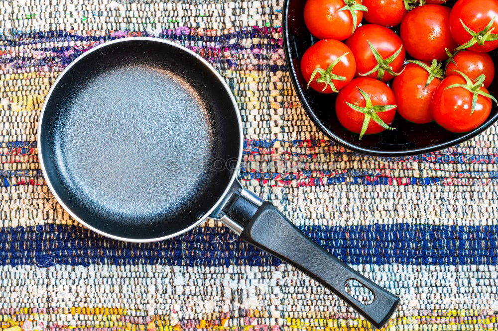 Similar – empty round black frying pan, top view