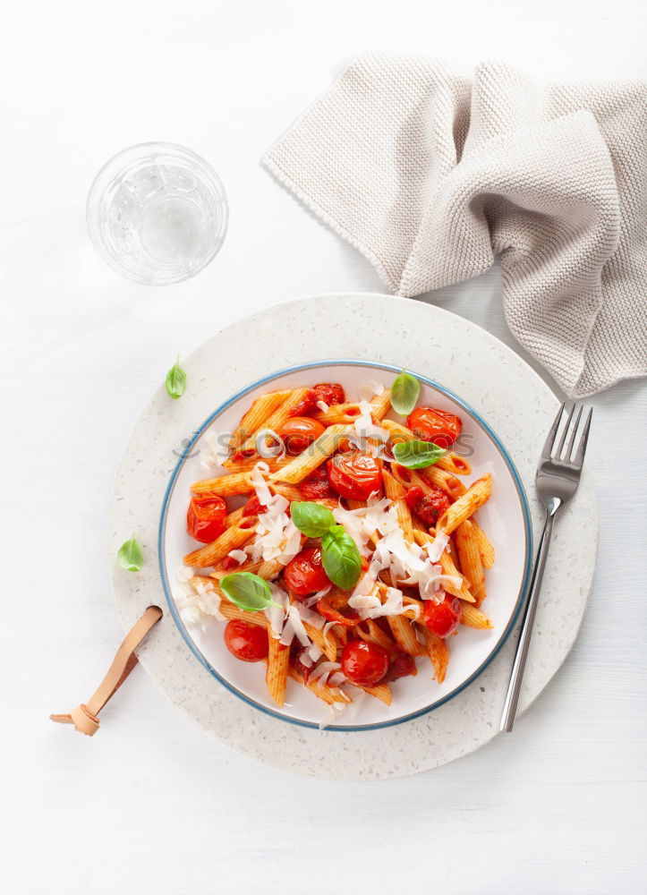 Similar – Plate of penne pasta with arrabiata sauce