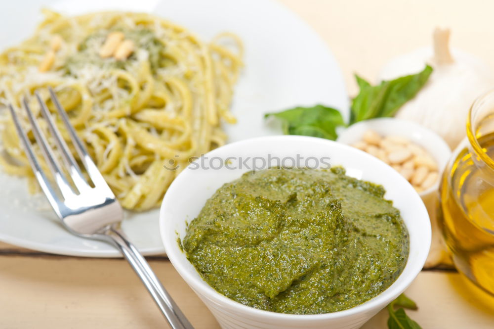 Similar – Bsilikum Pesto with spaghetti and tomatoes