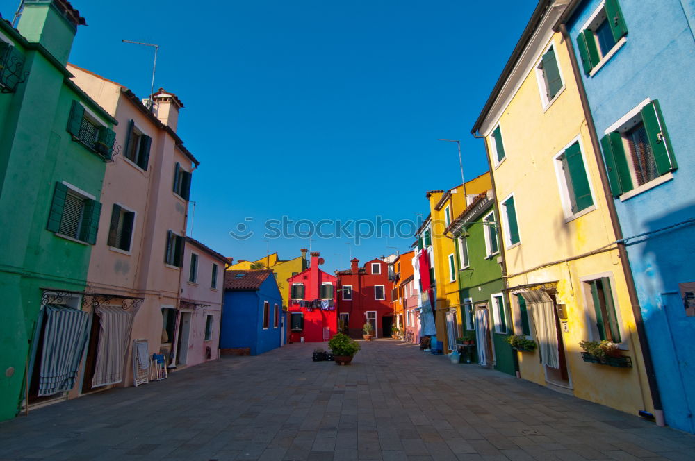 Similar – Image, Stock Photo Hung laundry on the lines in front of houses in Burano.