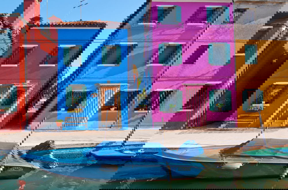 Similar – Image, Stock Photo Hung laundry on the lines in front of houses in Burano.