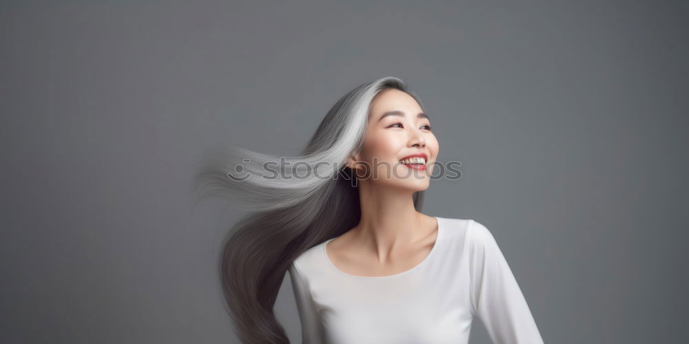 Similar – Asian woman shaking hair