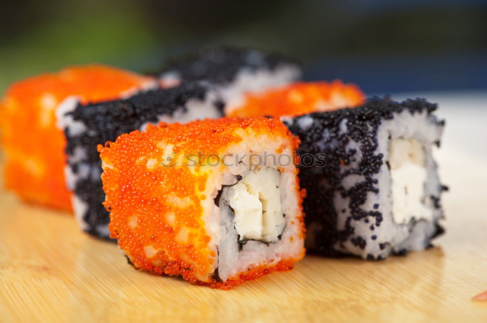 Similar – sushi assortment on black background.