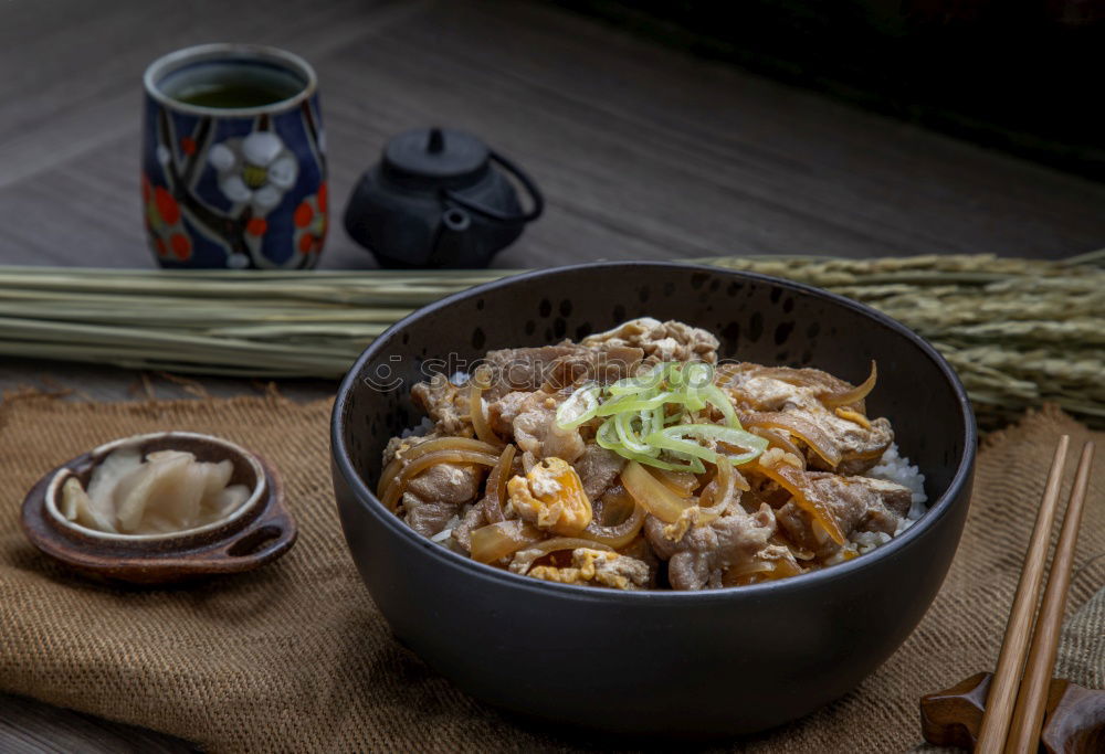 Similar – Geometric bowl of Asian Noodle Soup with chopsticks