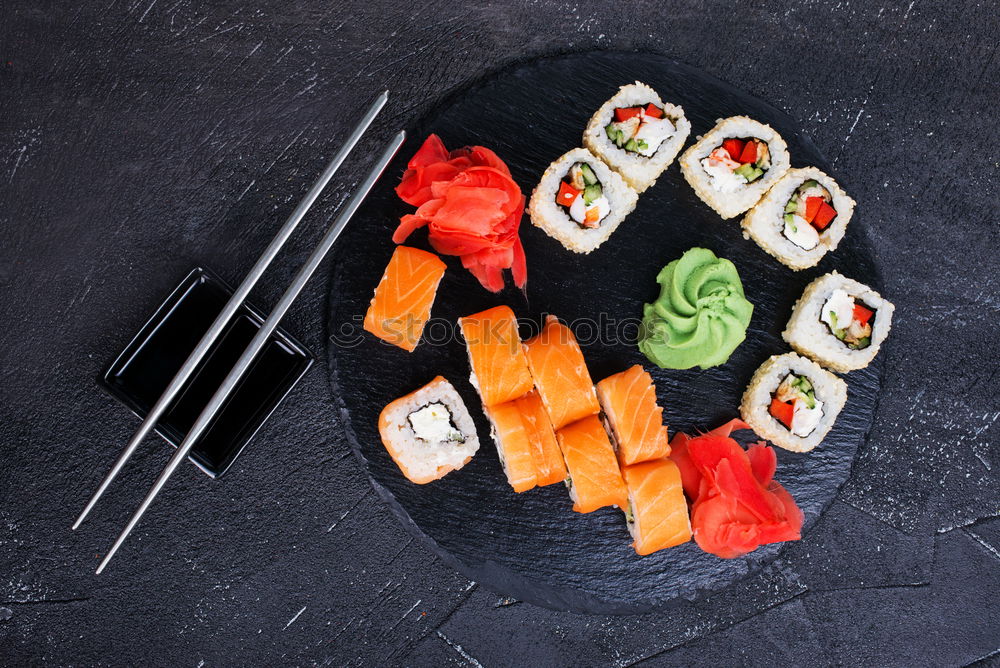 Similar – Image, Stock Photo Sushi served on blackboard