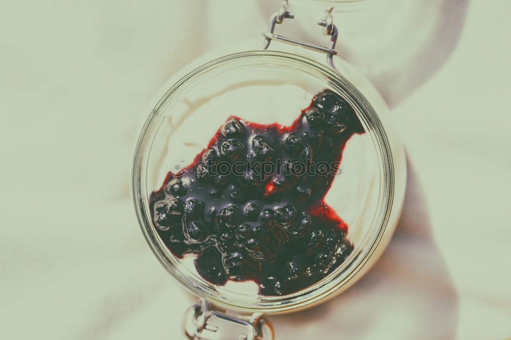 Jar Of No Bake Cheesecake With Blueberry Jam