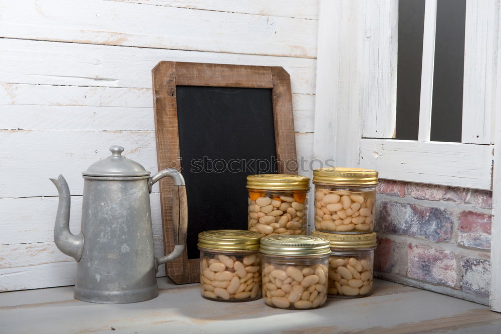 Similar – empty preserving jars on a shelf