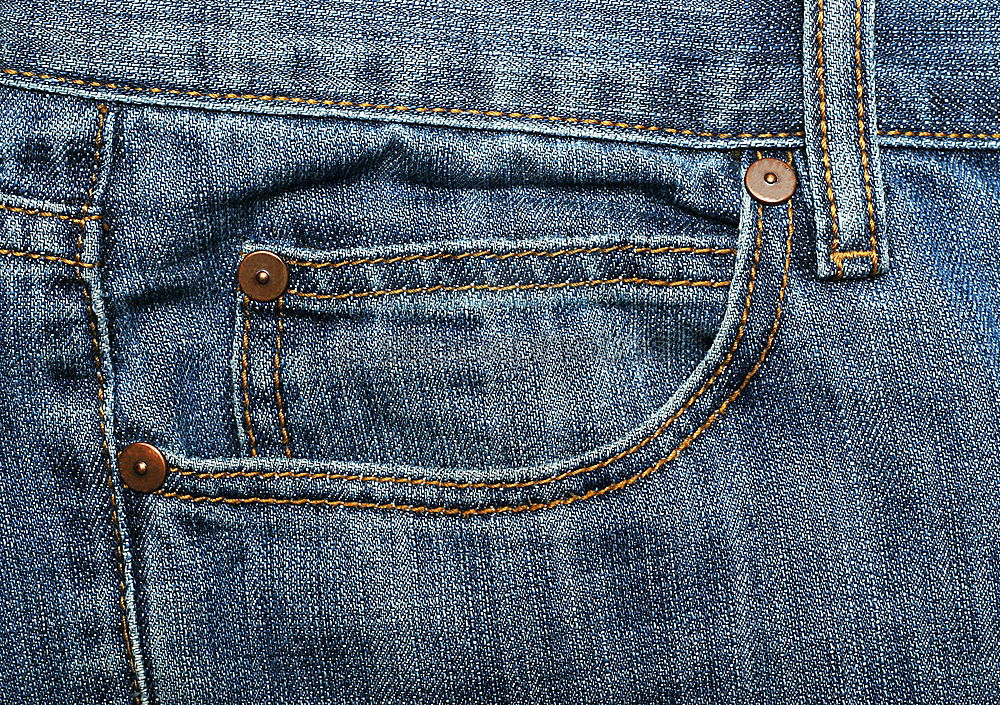 Similar – Textur-Tasche einer blauen, zerknitterten Jeans Makro-Nahaufnahme